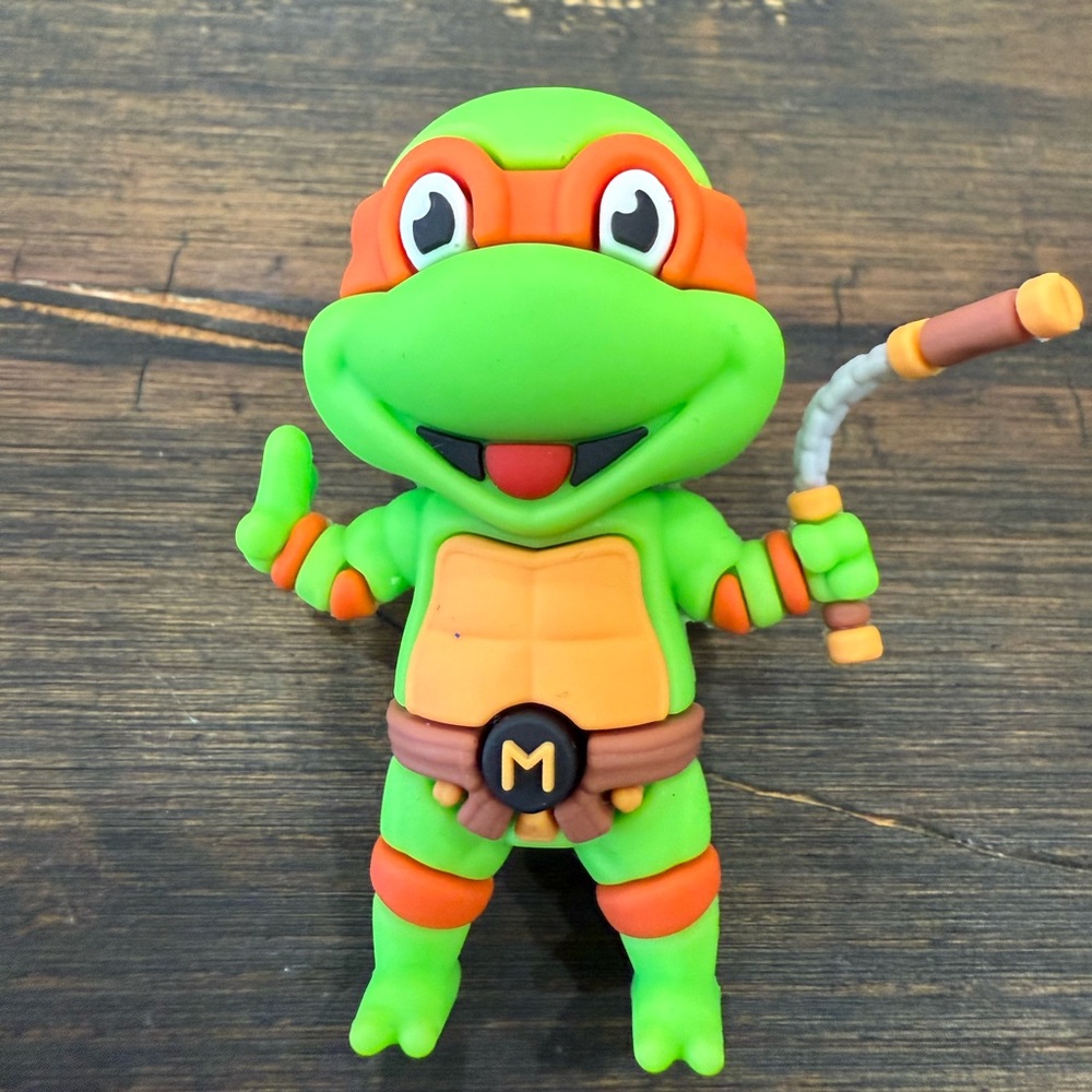 Green and Orange Ninja Turtle Figure